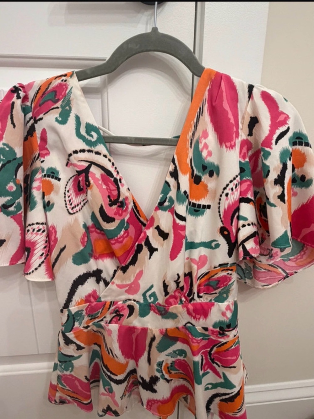 V-Neck Peplum Blouse in White Multi